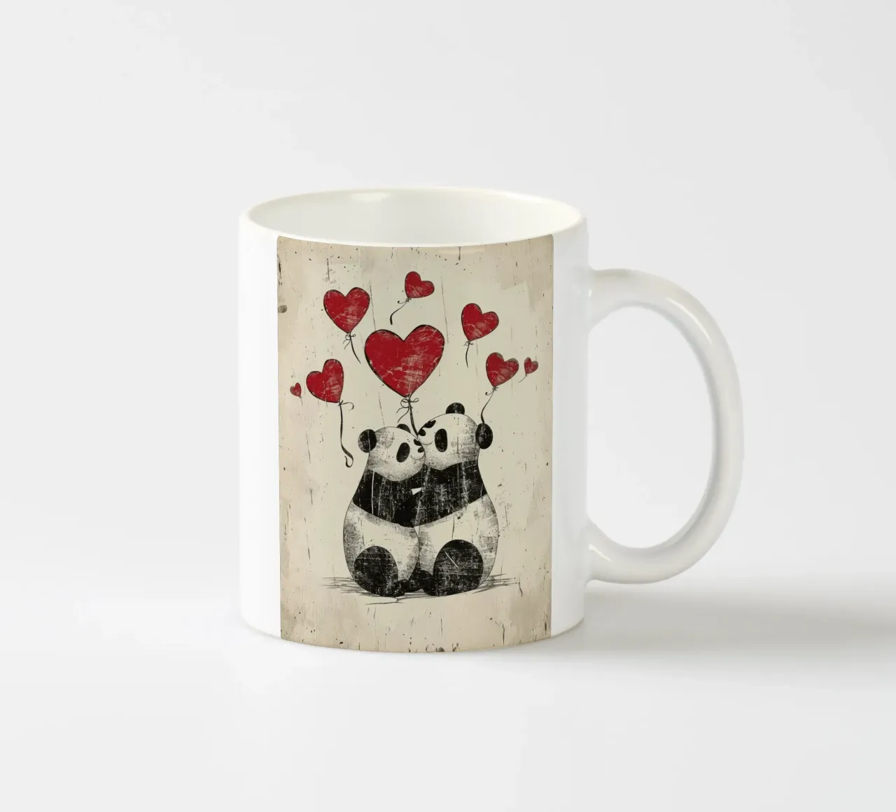 Des pandas échangent de l'affection avec des ballons en forme de cœur mug en céramique de DesignDoodle