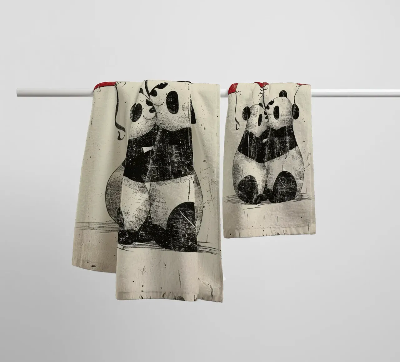 Pandas tauschen Zuneigung mit herzförmigen Luftballons aus Handtuch von DesignDoodle
