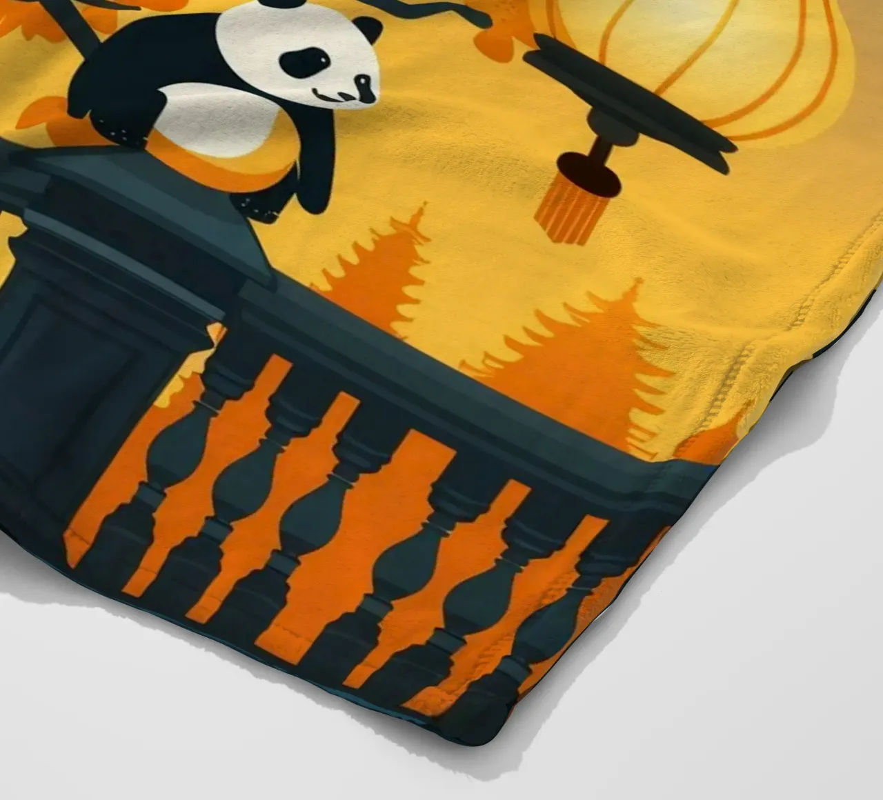 Panda resting beneath lanterns in a tranquil autumn landscap fleece blanket by DesignDoodle