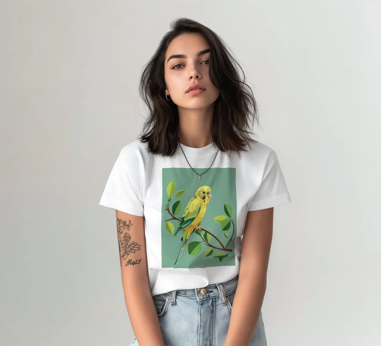 Budgerigar perched on a branch surrounded by green leaves t-shirt by DesignDoodle