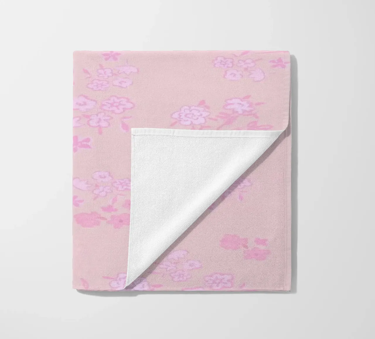Pink ditsy pattern with pink pattern beach towel by gulsengunel