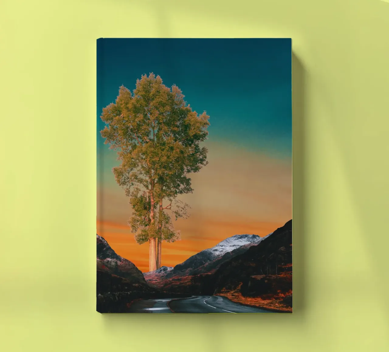 Road through mountains with a tree notebook by Berwies Artwork