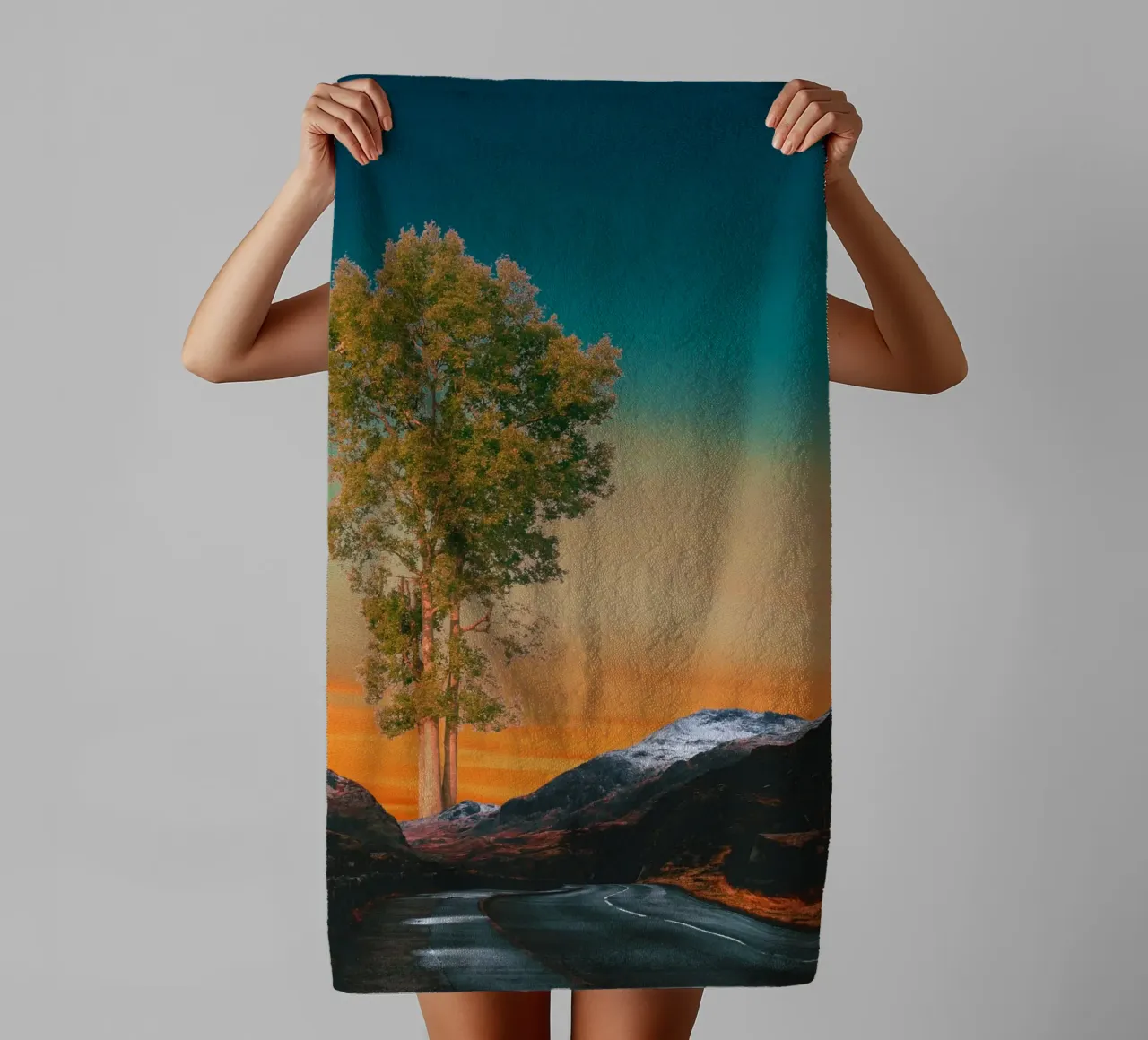 Road through mountains with a tree towel by Berwies Artwork