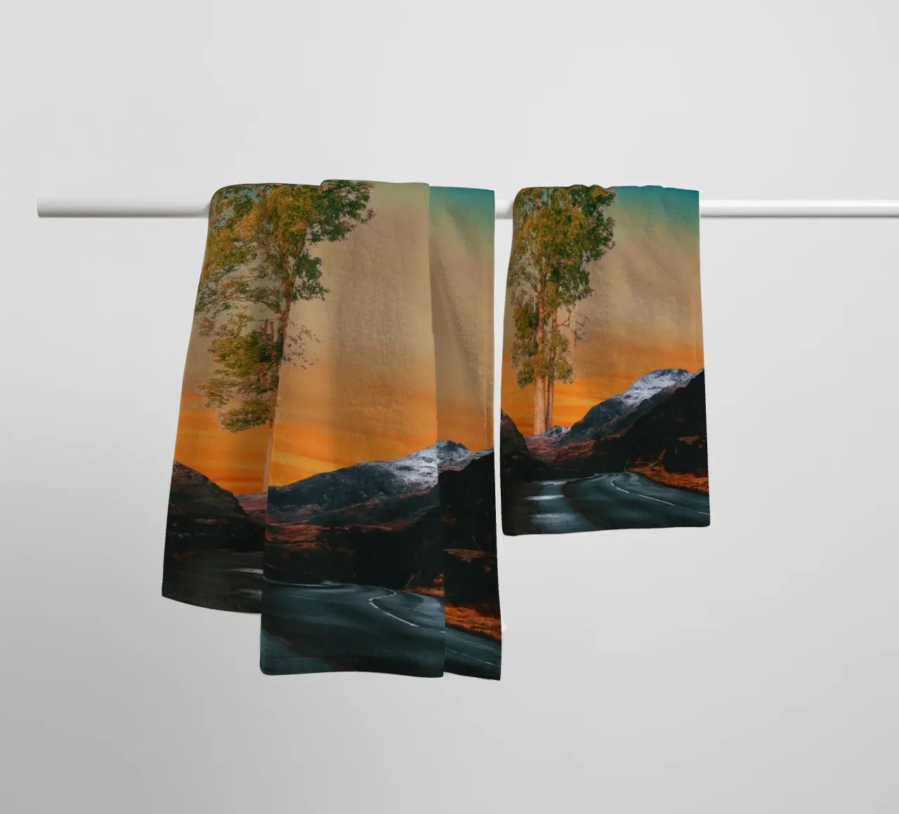 Road through mountains with a tree towel by Berwies Artwork