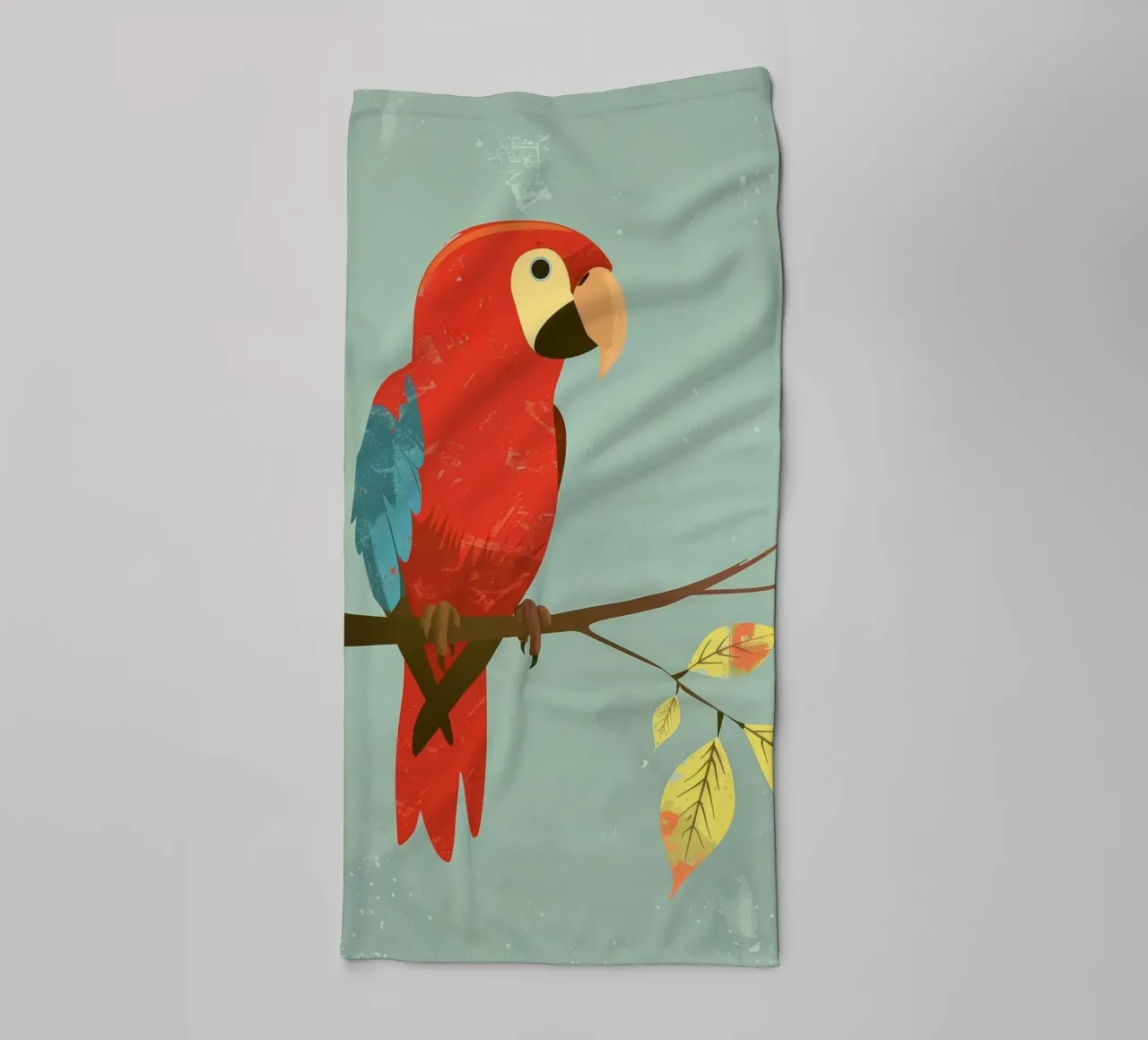 Red parrot perched on a branch surrounded by autumn leaves towel by DesignDoodle