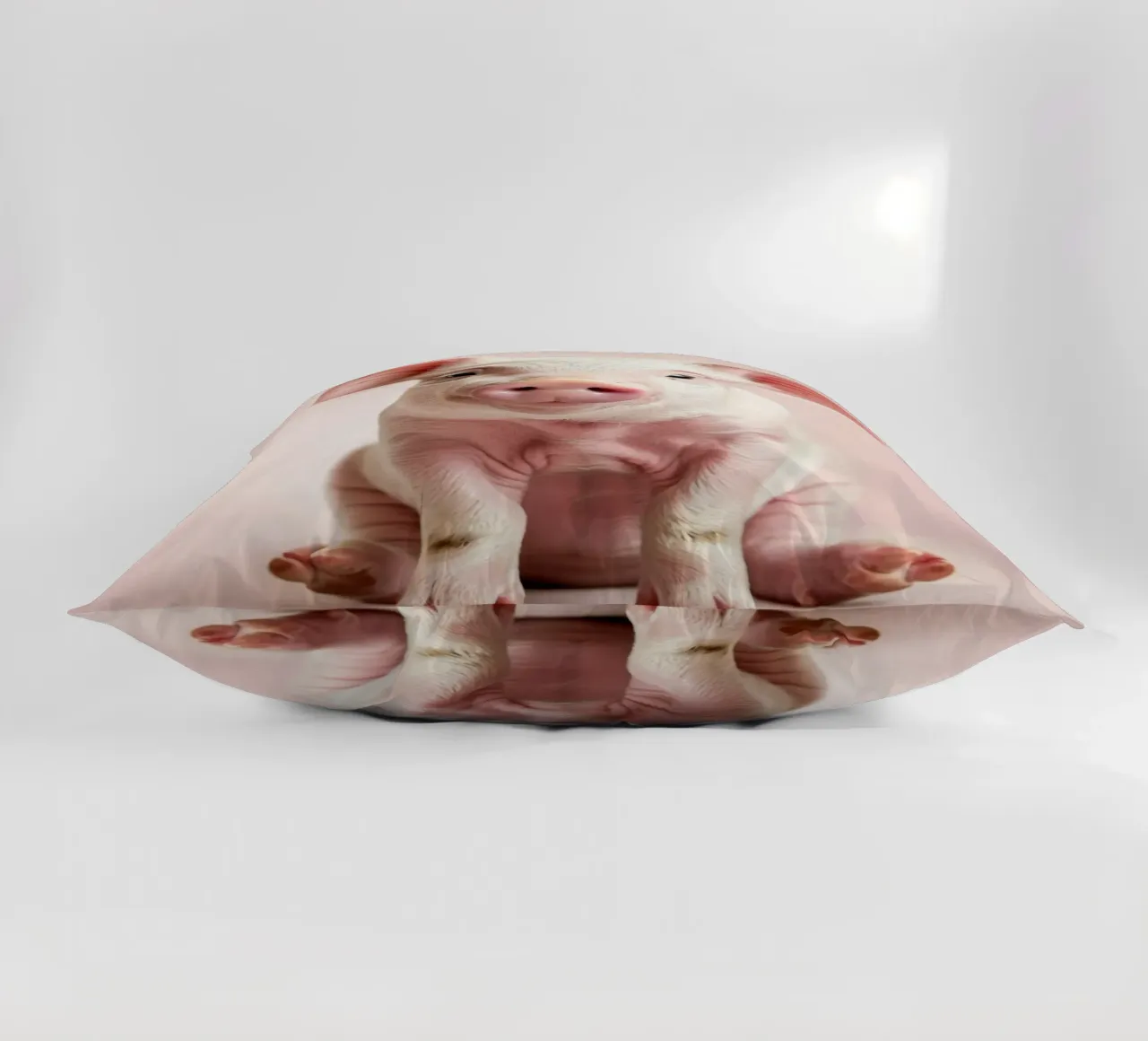 Cute piglet sits calmly against a soft pink background decorative cushion by DesignDoodle