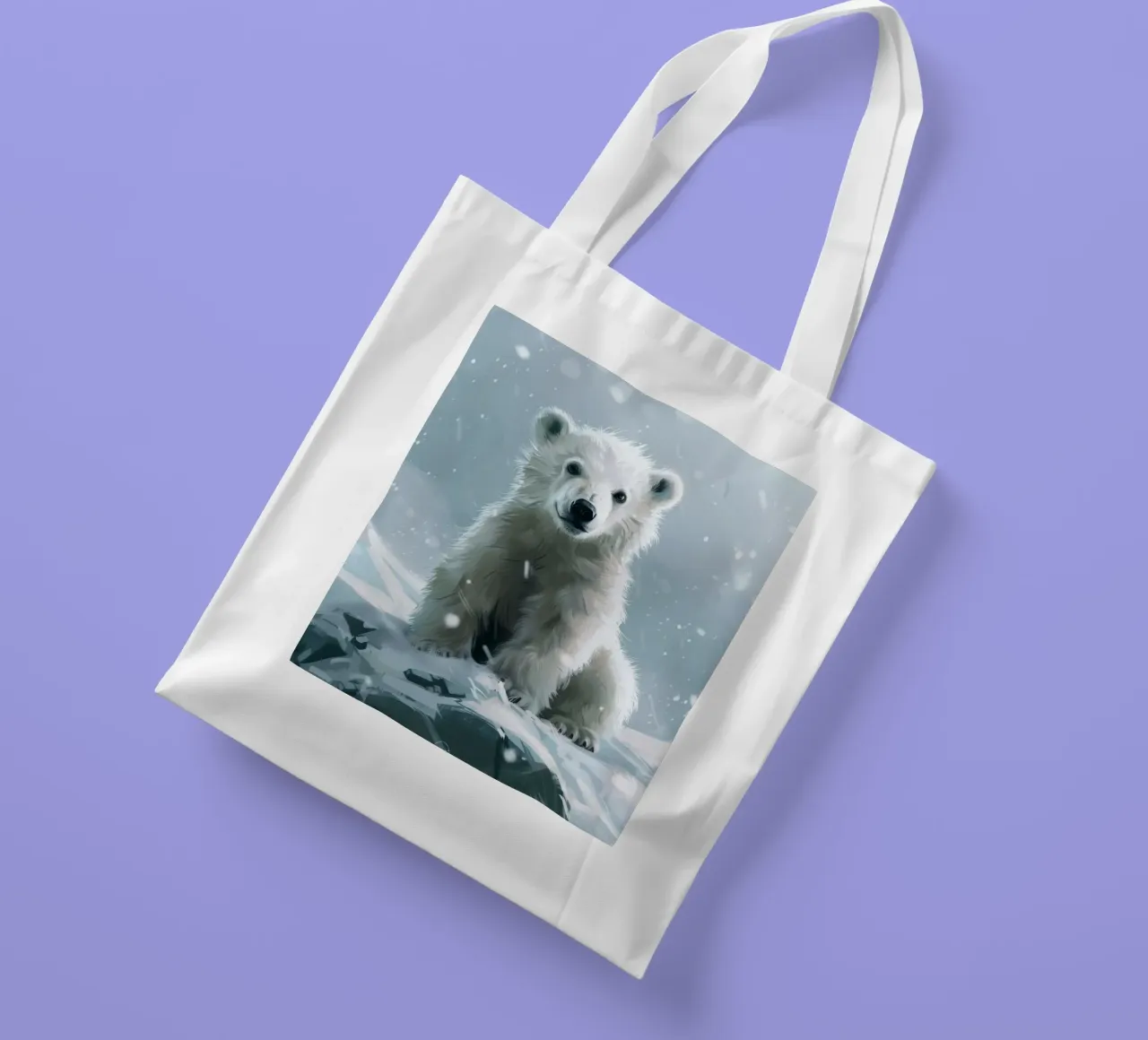 Cucciolo di orso polare seduto su un paesaggio innevato con neve cadente borsa in juta da DesignDoodle