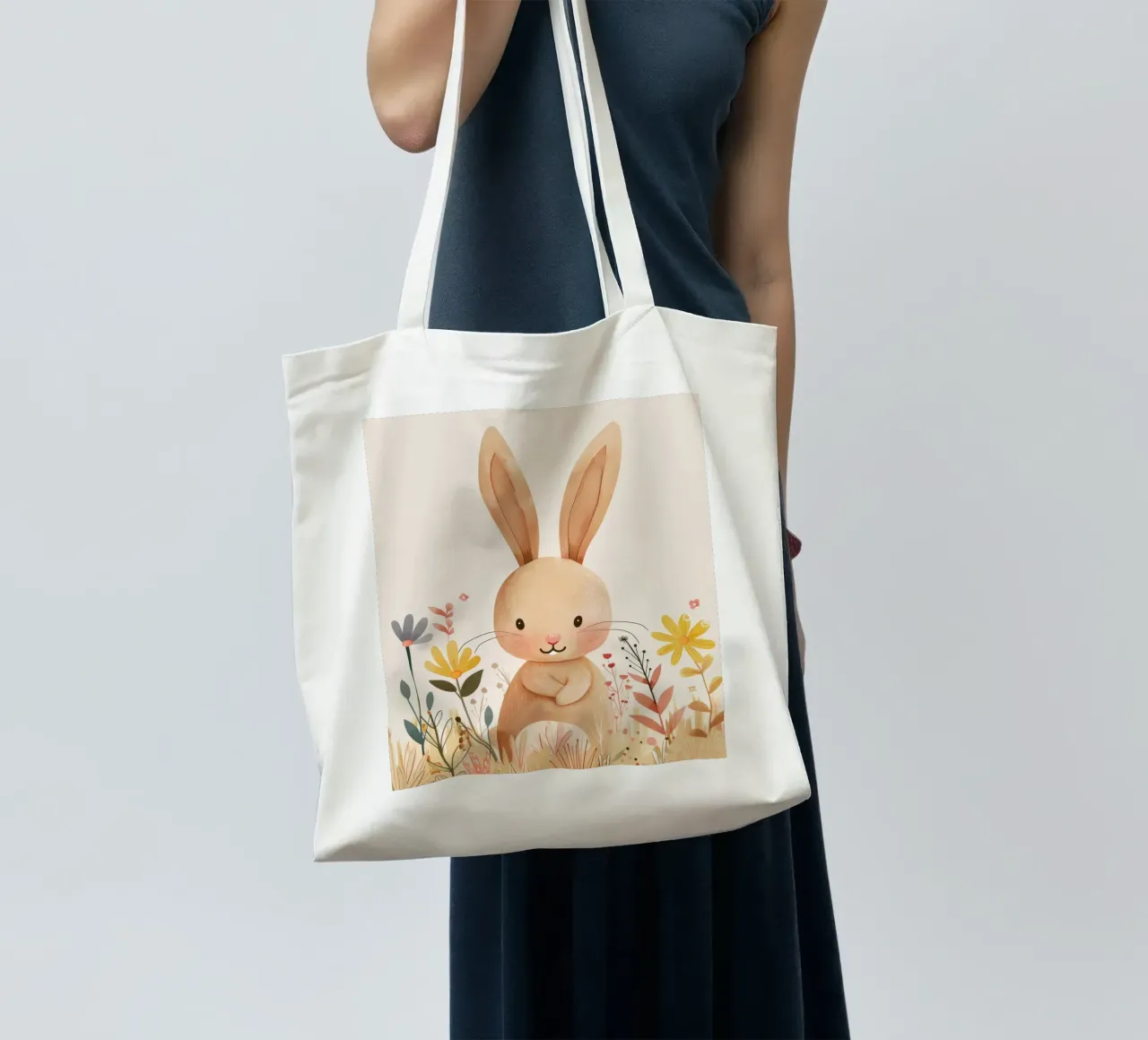 Whimsical rabbit in a garden surrounded by flowers tote bag by DesignDoodle