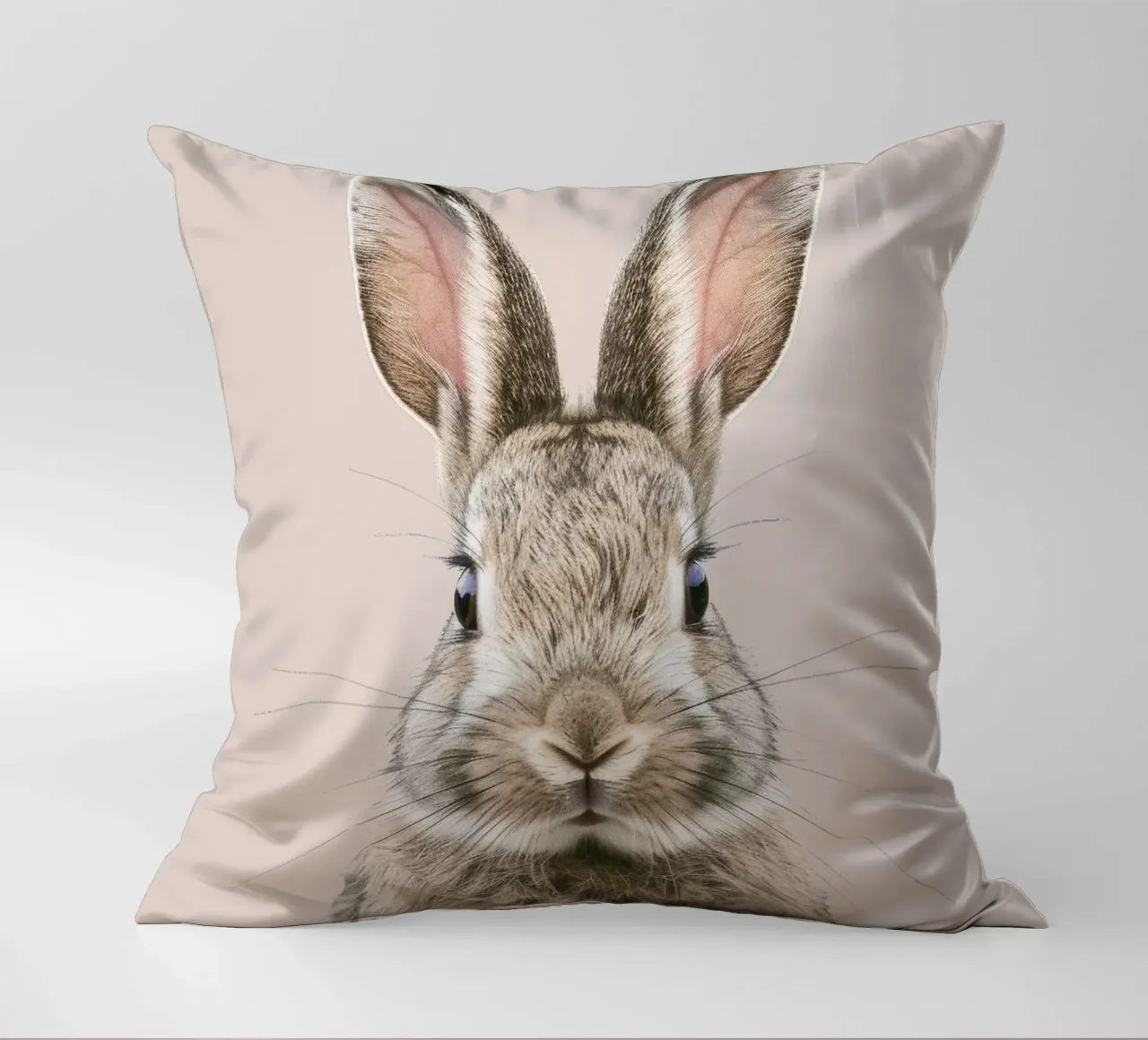 Fluffy rabbit with expressive eyes against a neutral art decorative cushion by DesignDoodle