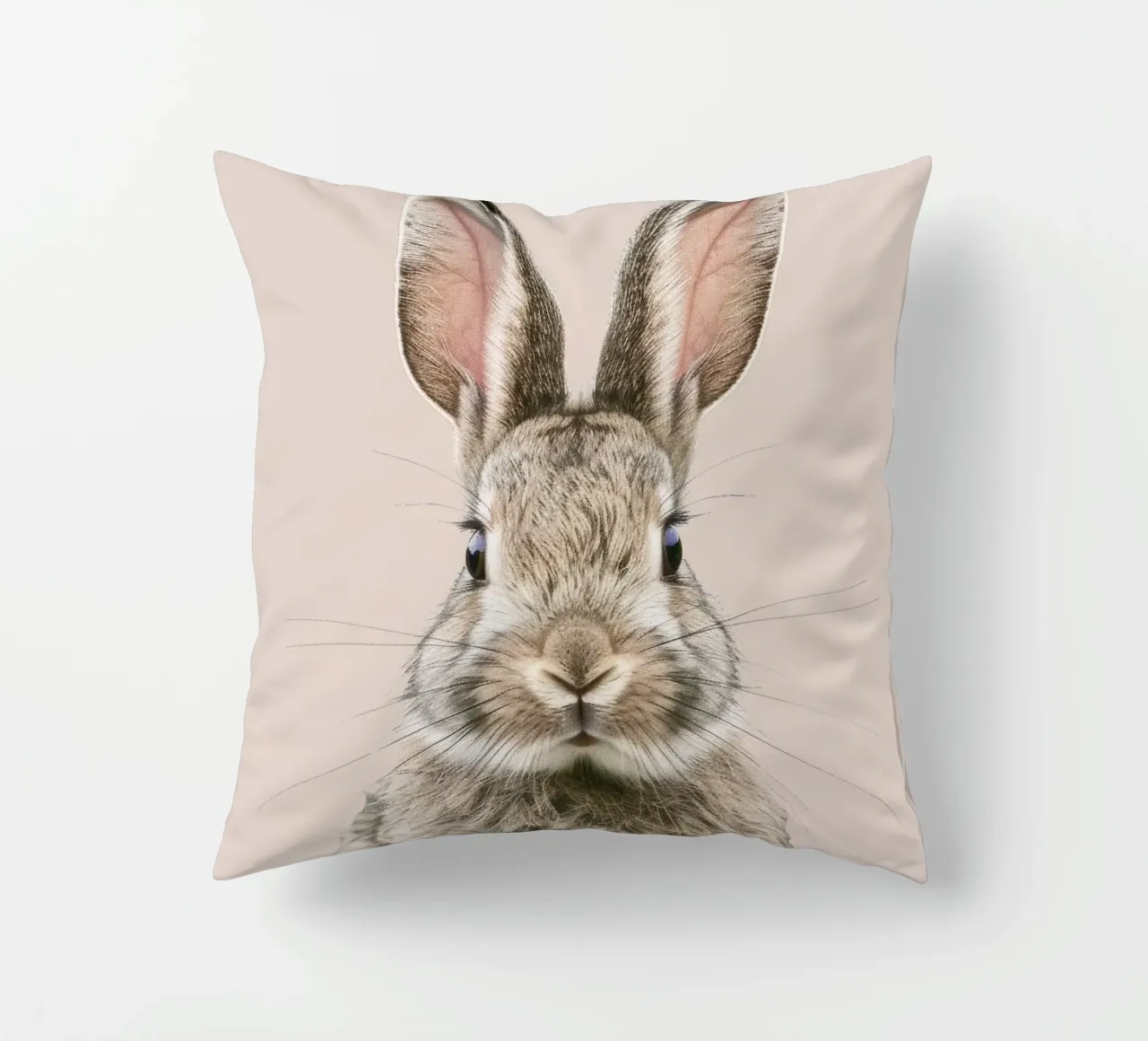 Fluffy rabbit with expressive eyes against a neutral art decorative cushion by DesignDoodle