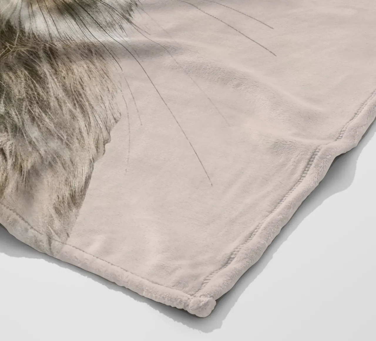 Fluffy rabbit with expressive eyes against a neutral art fleece blanket by DesignDoodle