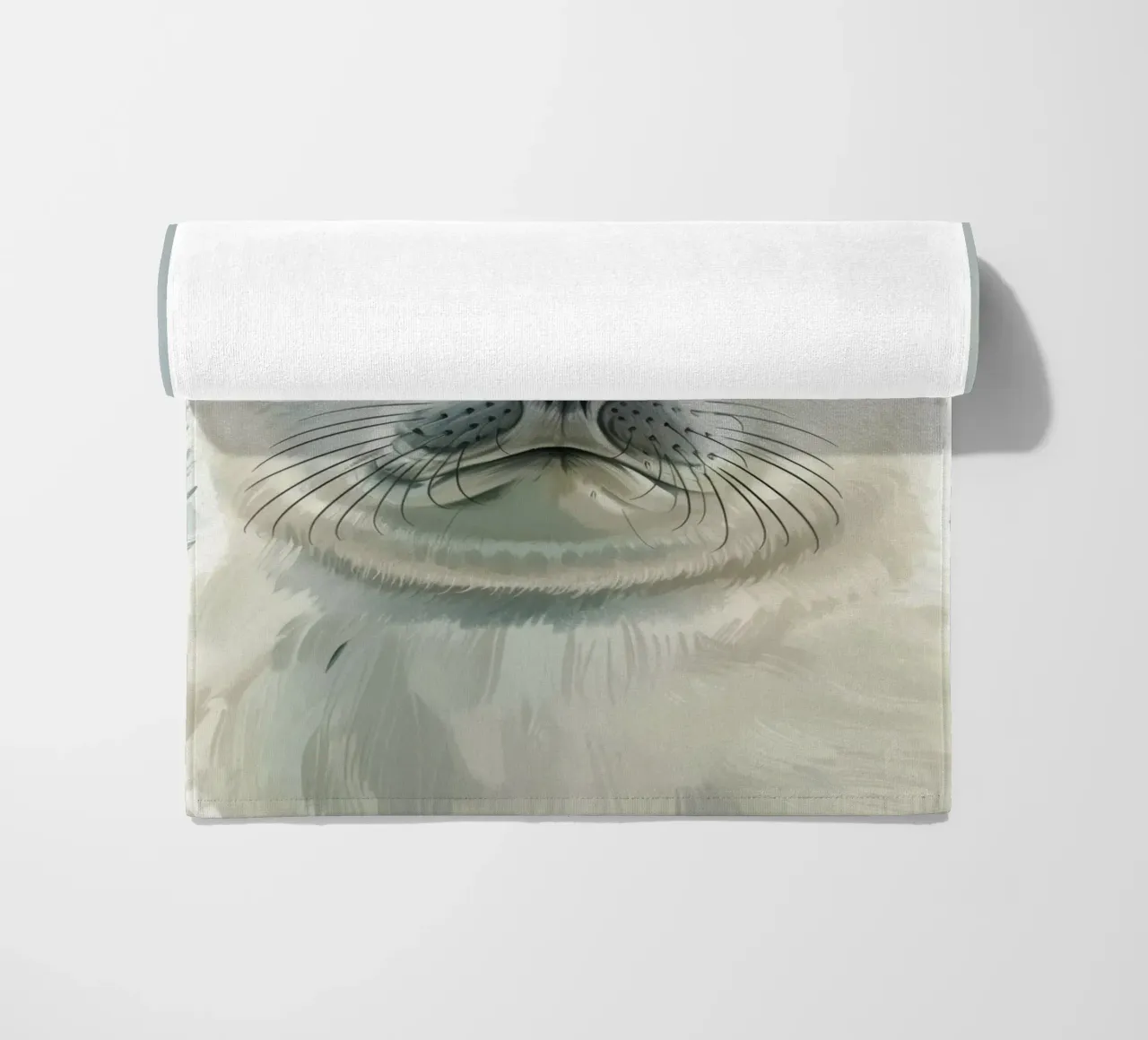 Portrait of a young seal looking curiously with a soft beach towel by DesignDoodle
