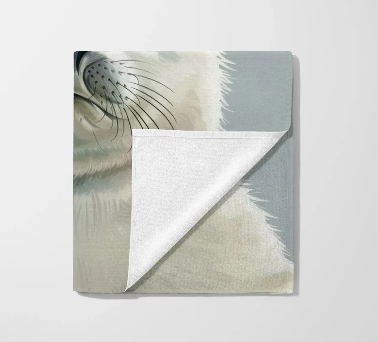 Portrait of a young seal looking curiously with a soft beach towel by DesignDoodle