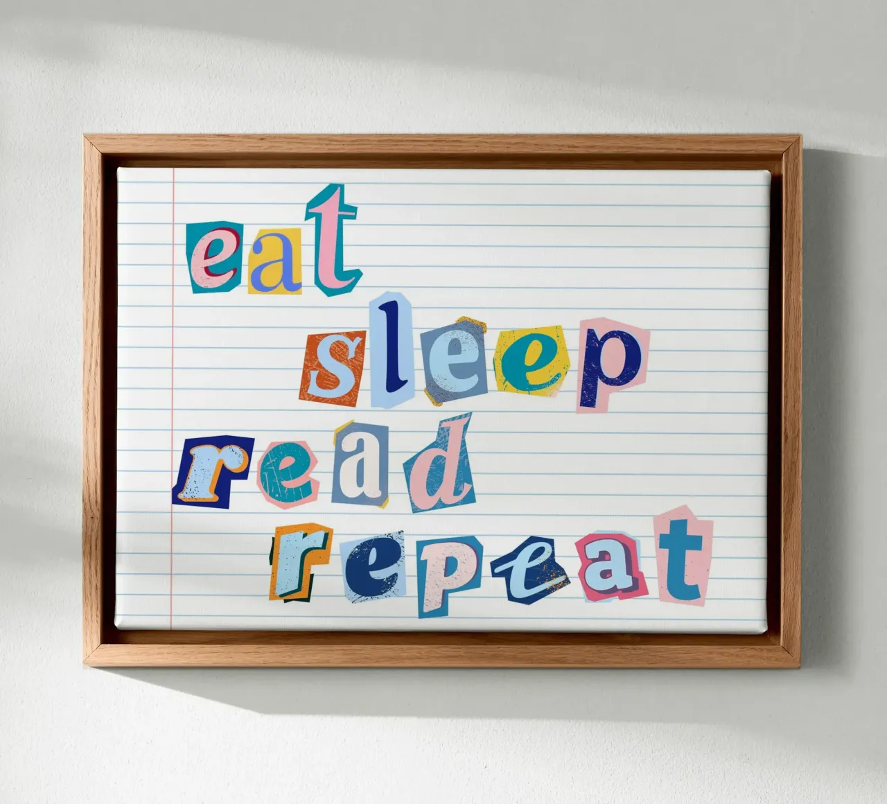 "Eat Sleep Read Repeat" Collage Style Reading Poster canvas with Floater frame by vintagepod