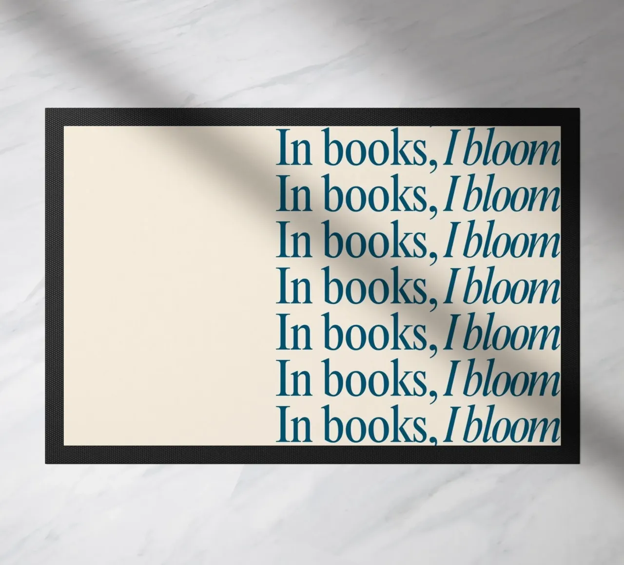 "In Books, I Bloom" Repetitive Typography Art Print doormat by vintagepod