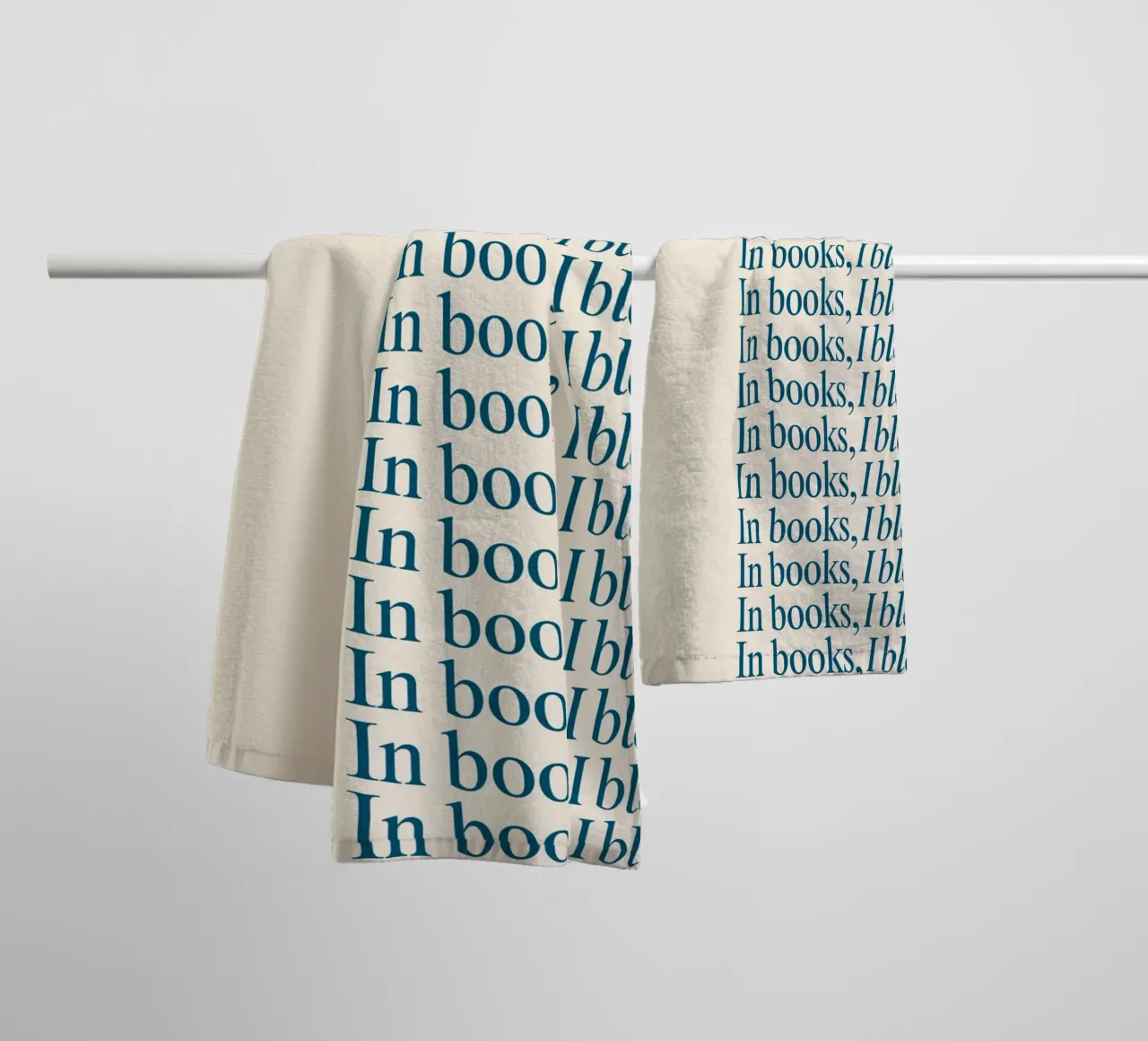 "In Books, I Bloom" Repetitive Typography Art Print towel by vintagepod