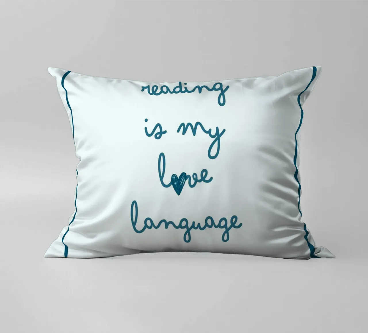 Affiche "Reading Is My Love Language" (La lecture est ma langue d'amour) avec nœud bleu coussin de vintagepod