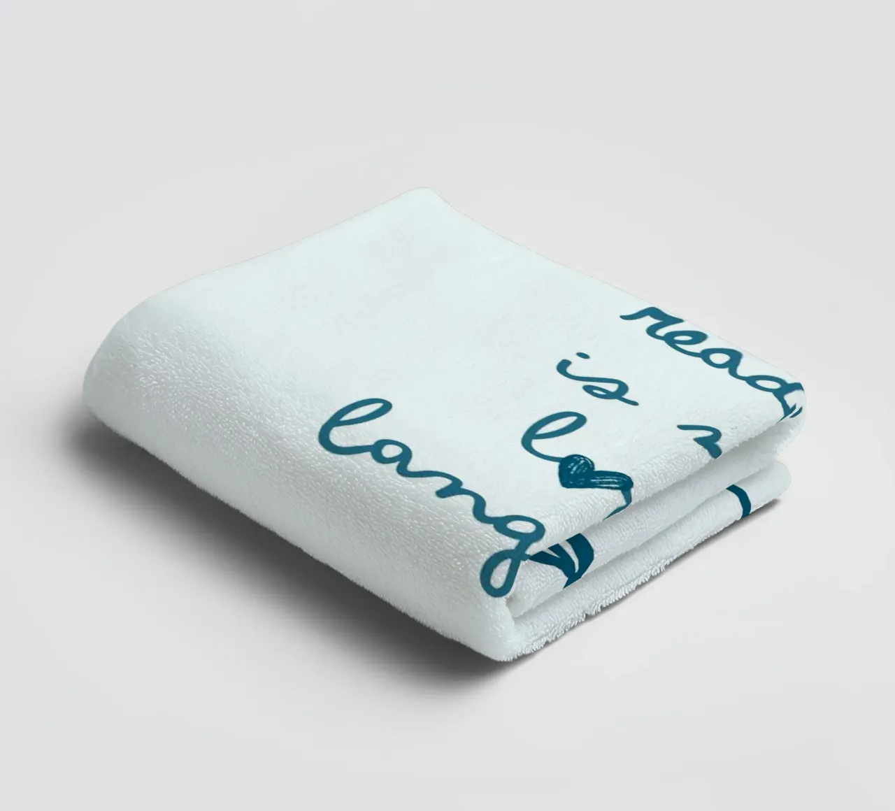 Affiche "Reading Is My Love Language" (La lecture est ma langue d'amour) avec nœud bleu serviette de bain de vintagepod
