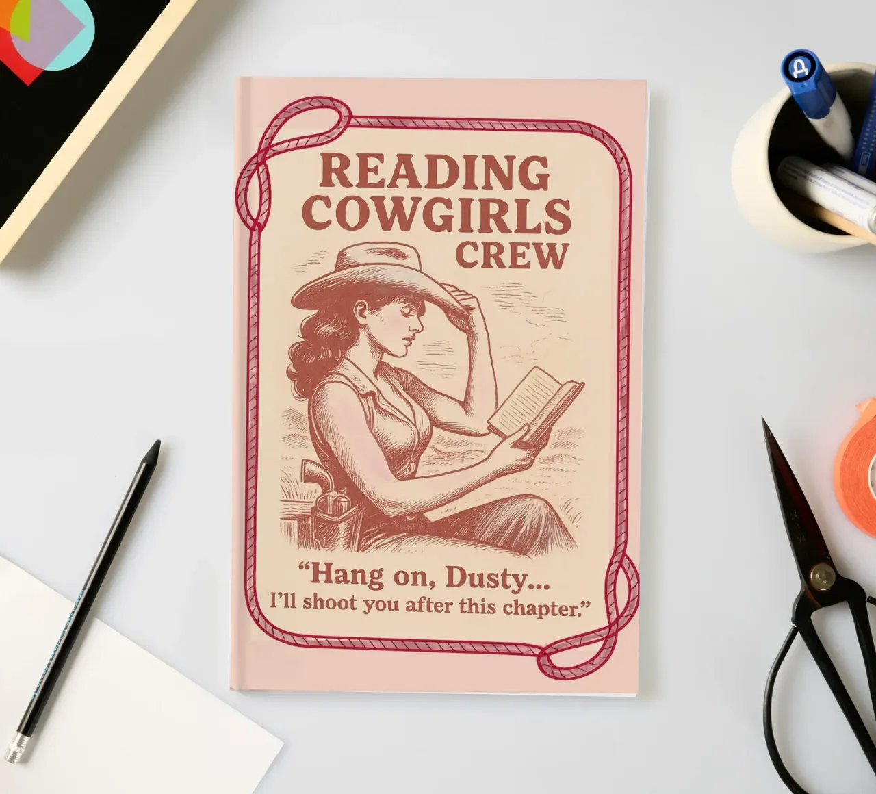 Reading Cowgirls Crew: hang on Dusty notebook by Taika Tori Art
