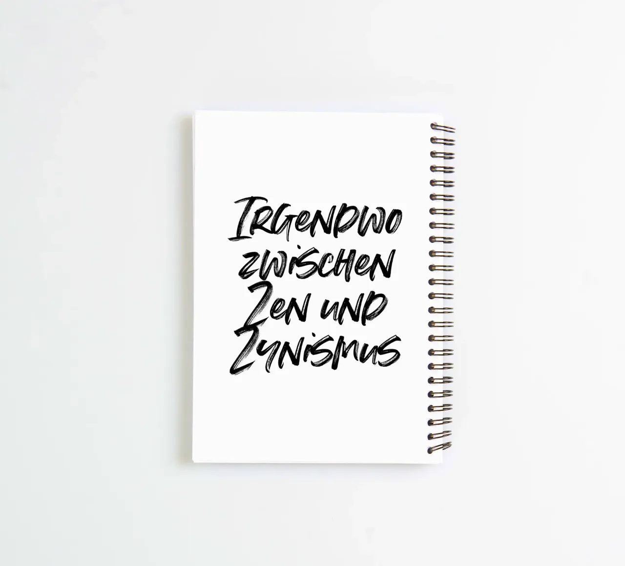 Zwischen Zen und Zynismus | minimalistic design spiral notebook by just typo