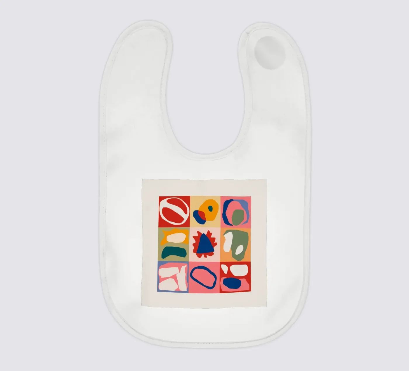Playful Shape Patchwork baby bib by Prism Ritual