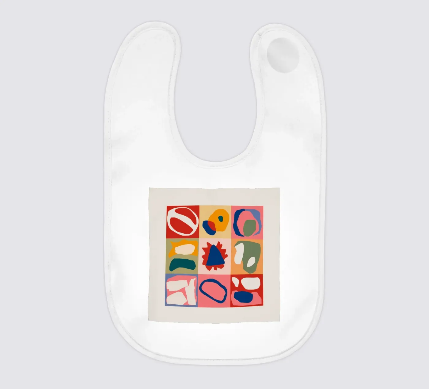 Playful Shape Patchwork baby bib by Prism Ritual