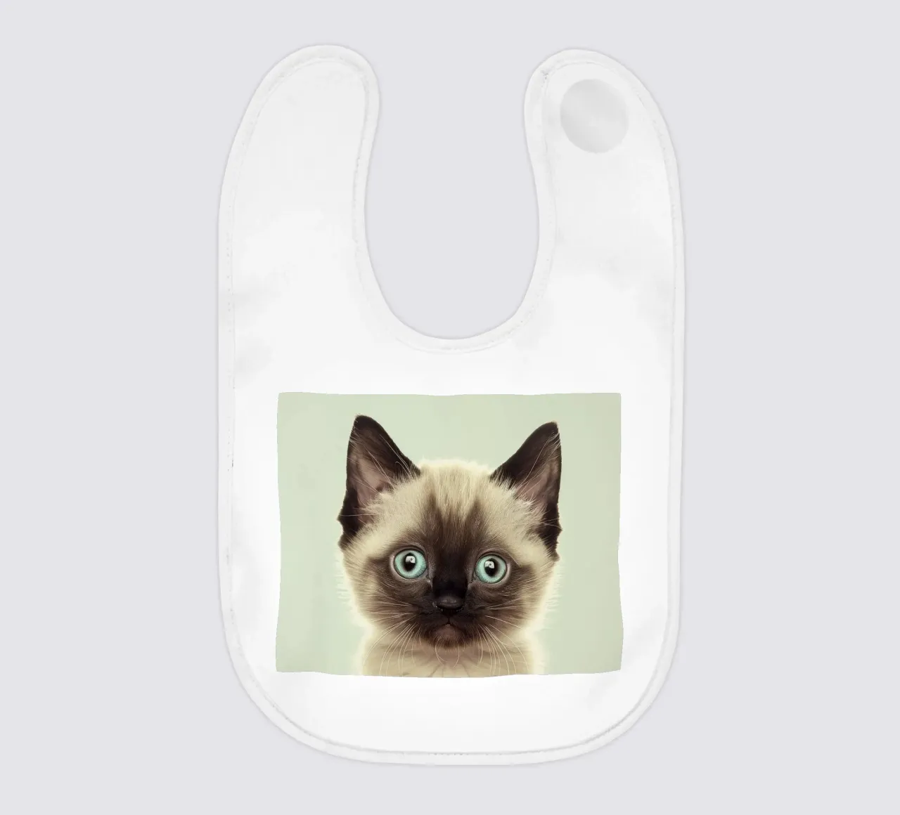 Un simpatico gattino con straordinari occhi azzurri e marcature distinte bavaglino da DesignDoodle