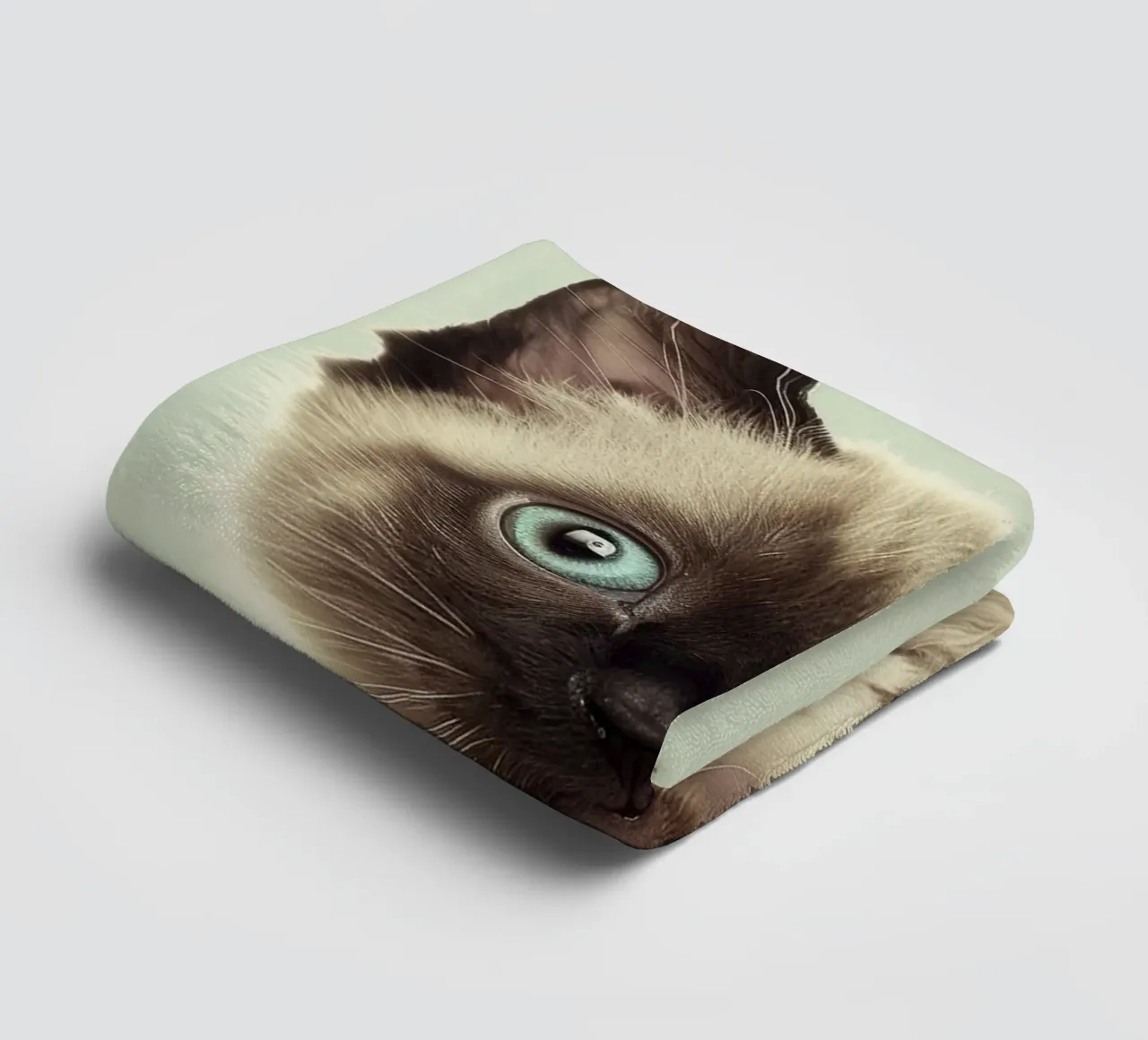 Cute kitten with striking blue eyes and distinct markings towel by DesignDoodle