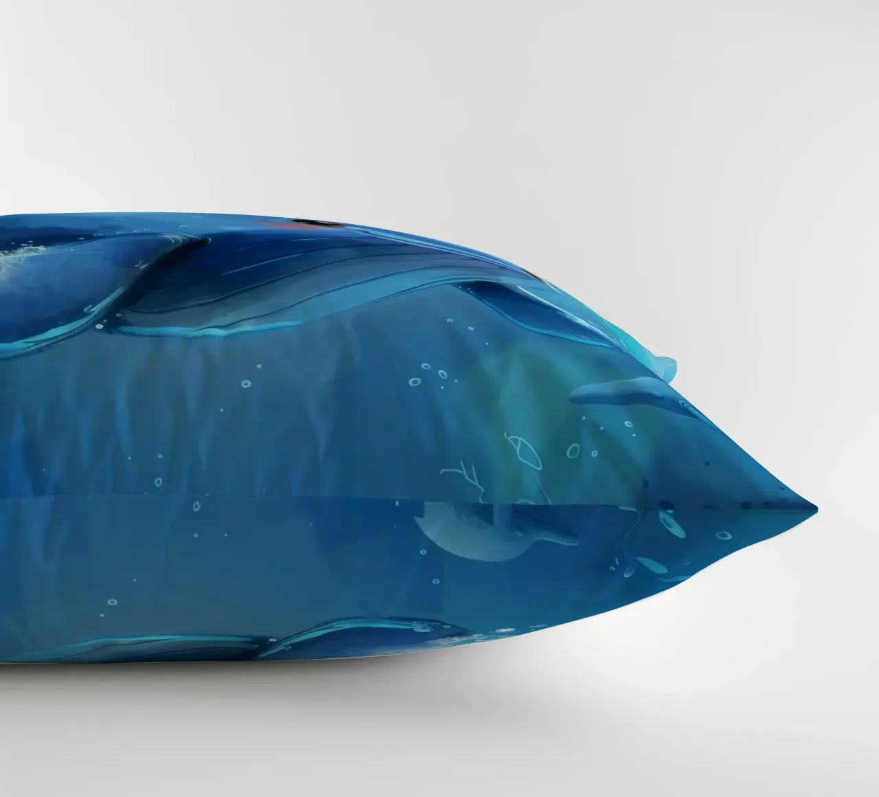 Affascinante balenottera azzurra che nuota giocosamente in un luminoso sottofondo cuscino da DesignDoodle