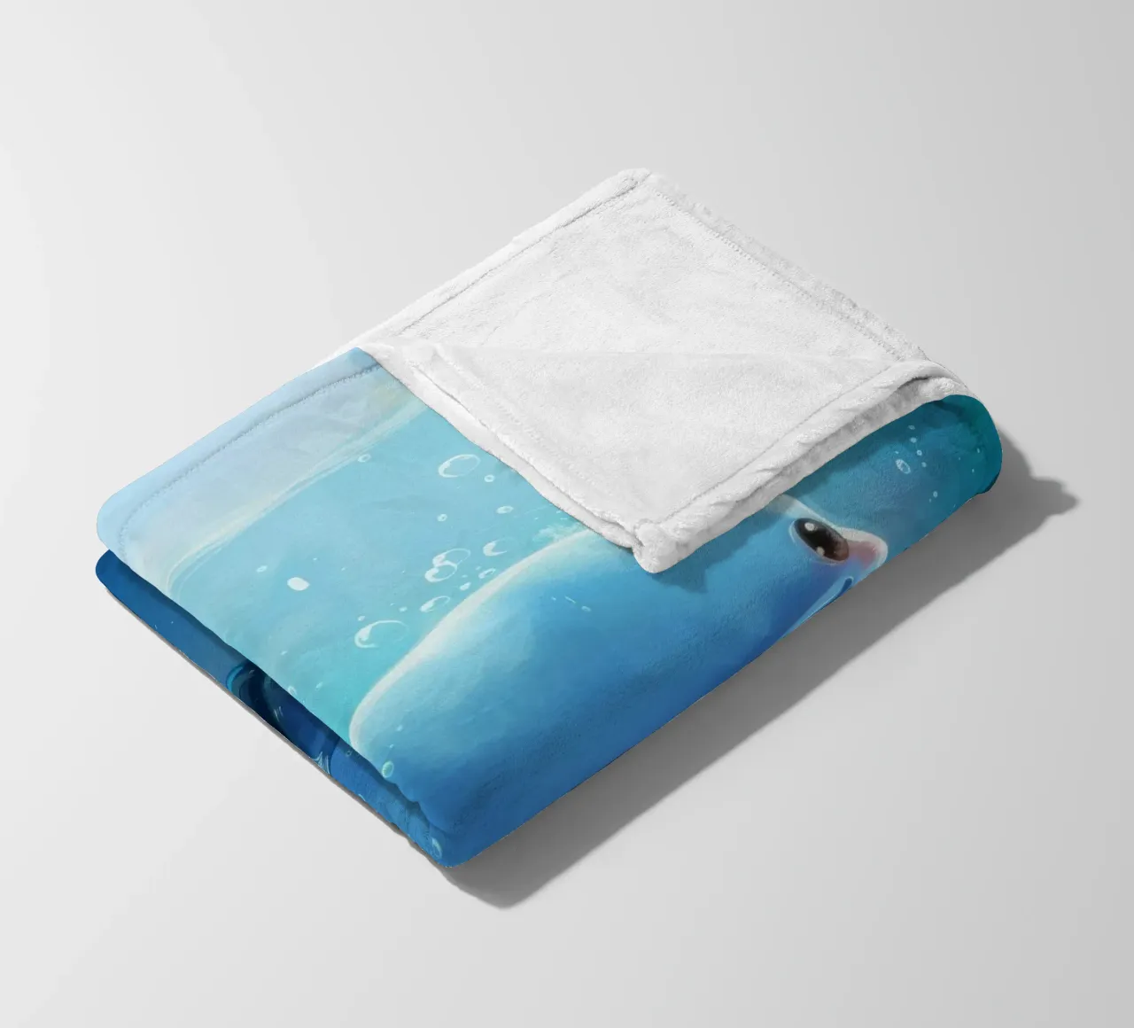 Charming blue whale swimming playfully in a bright underwate fleece blanket by DesignDoodle