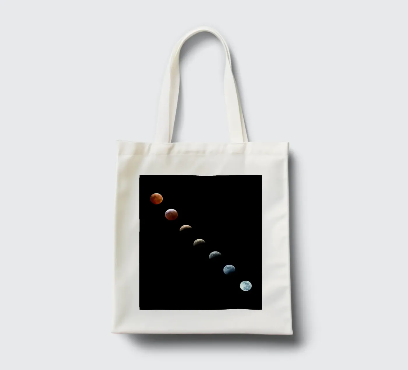moon lunar-eclipse tote bag by Earthly Visions