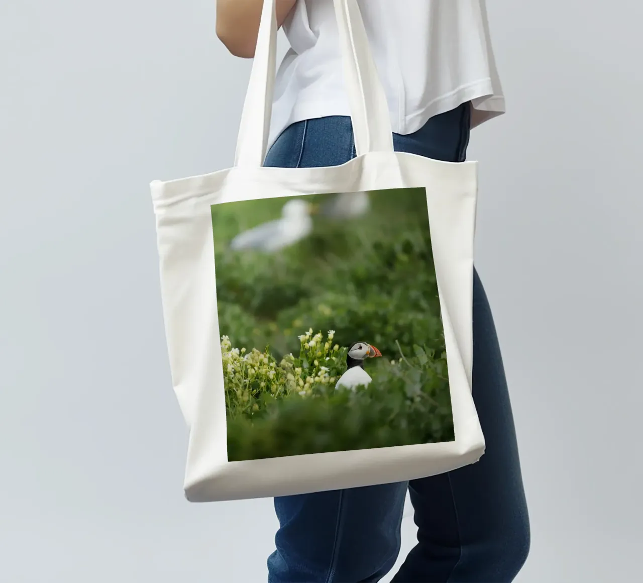 Puffin in flower fields tote bag by Tom's Wildlife