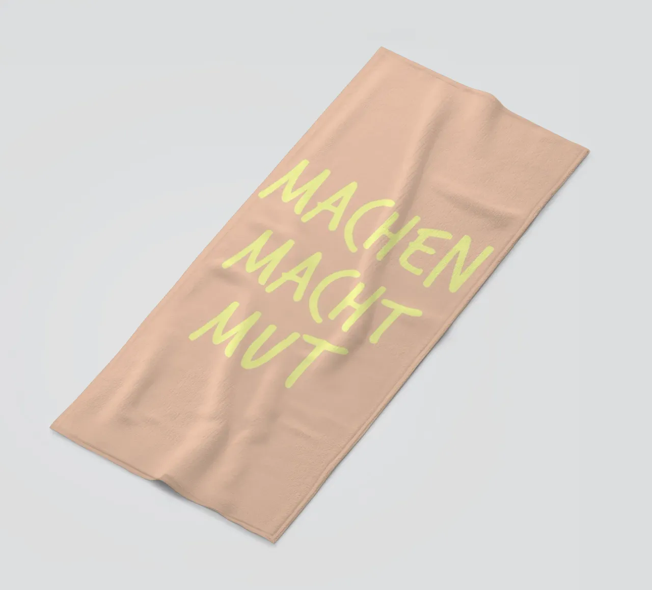 Machen macht Mut. beach towel by FRICKE DESIGN