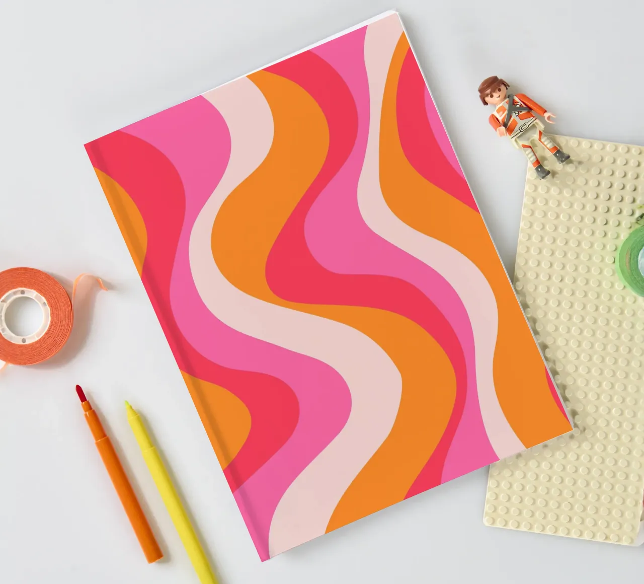 Vibrant Wavy Retro Pattern in Pink, Orange, and Coral Tones notebook by The Art Club