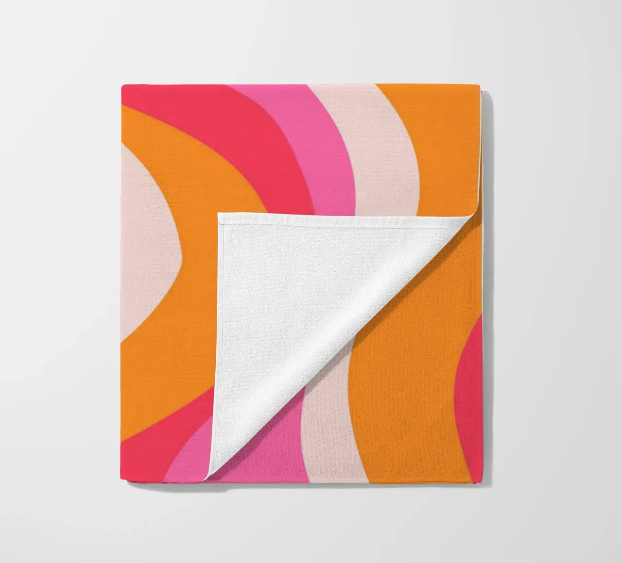 Vibrant Wavy Retro Pattern in Pink, Orange, and Coral Tones beach towel by The Art Club