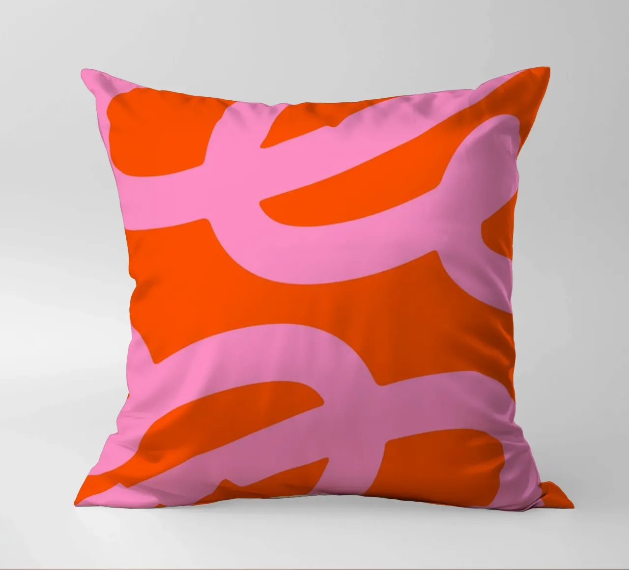 Bold Abstract Scribble Design in Pink and Orange decorative cushion by The Art Club