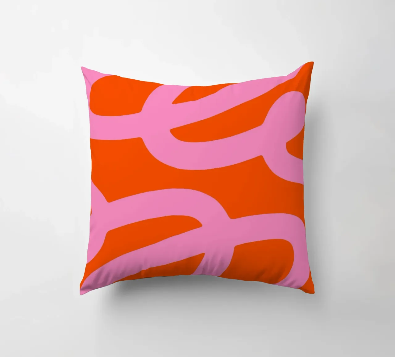 Bold Abstract Scribble Design in Pink and Orange decorative cushion by The Art Club