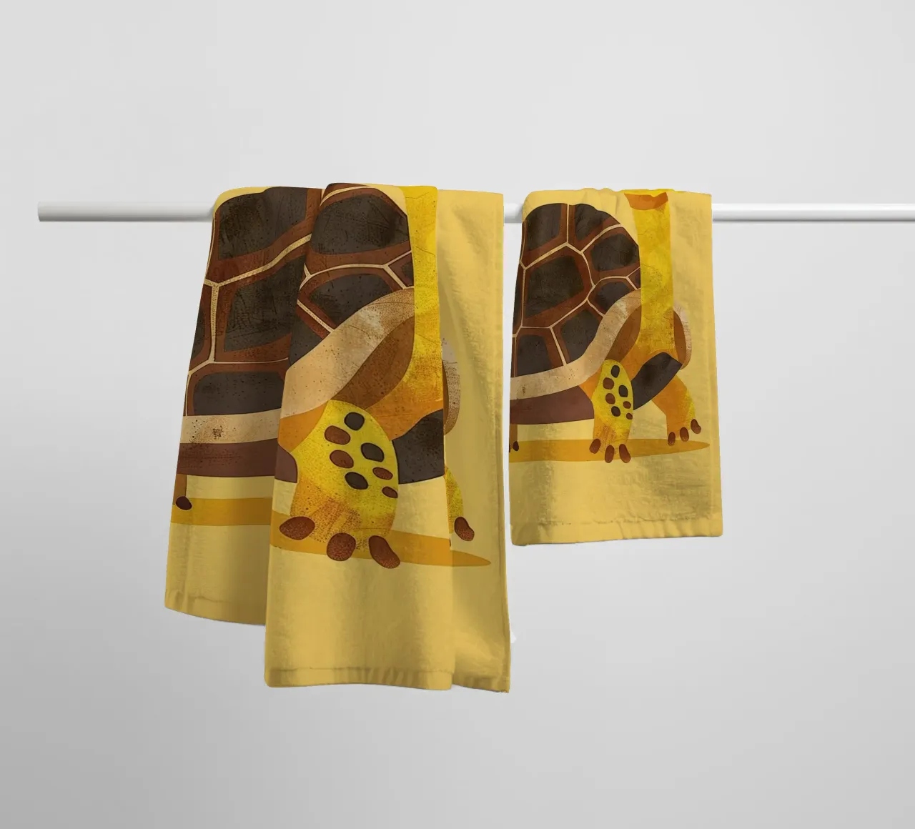 Turtle with a cheerful expression on a bright yellow art towel by DesignDoodle