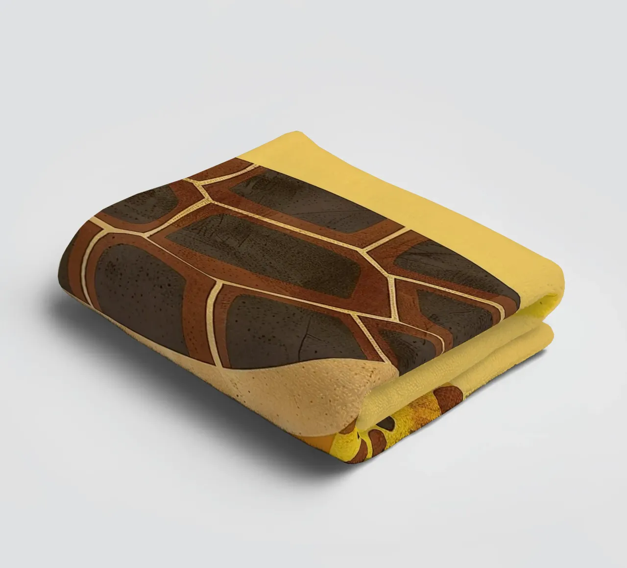 Turtle with a cheerful expression on a bright yellow art towel by DesignDoodle