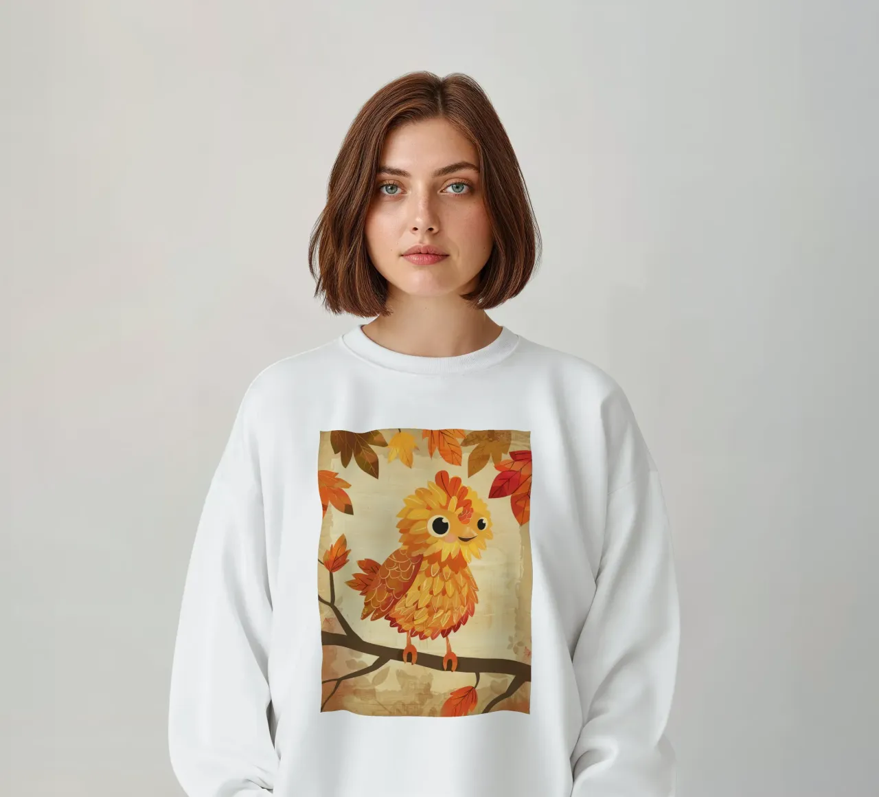 Charming bird perched on a branch with autumn leaves sweatshirt by DesignDoodle