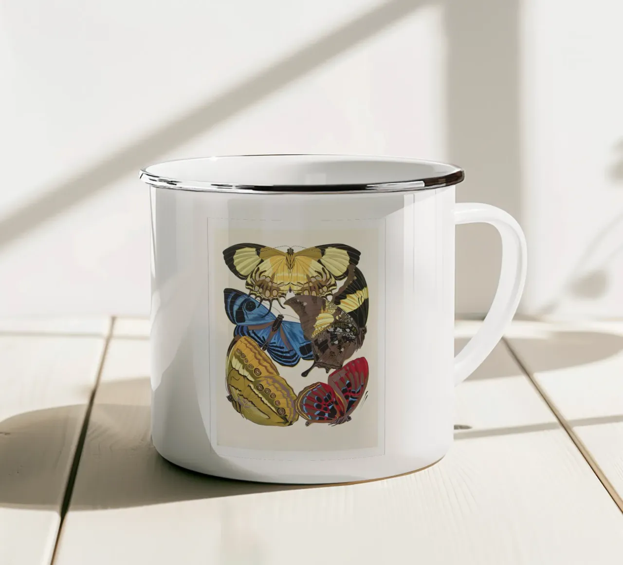 farfalle biodiversità tazza in smalto da Fred Marshall