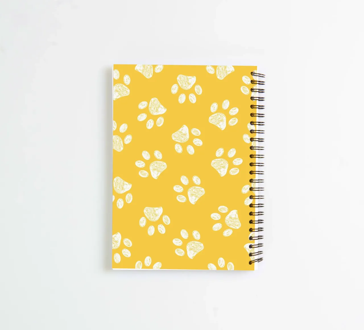 White paw prints with yellow background spiral notebook by gulsengunel