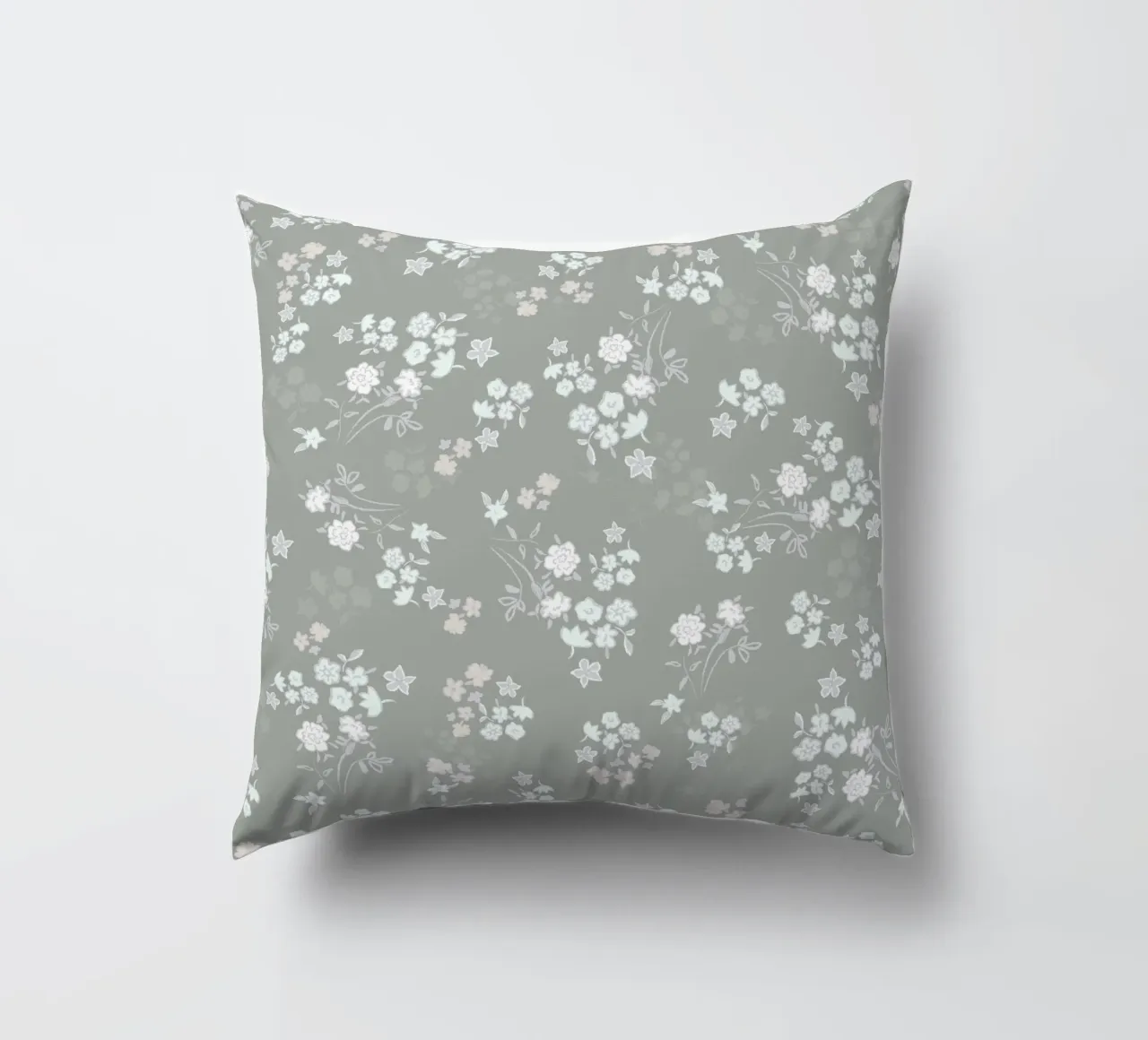 White ditsy pattern with green background decorative cushion by gulsengunel