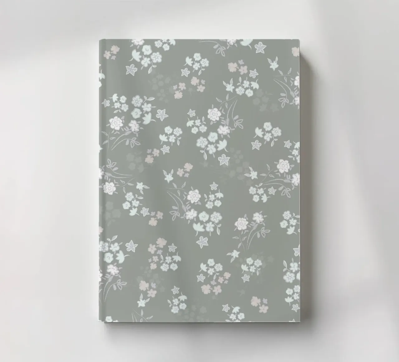 White ditsy pattern with green background notebook by gulsengunel