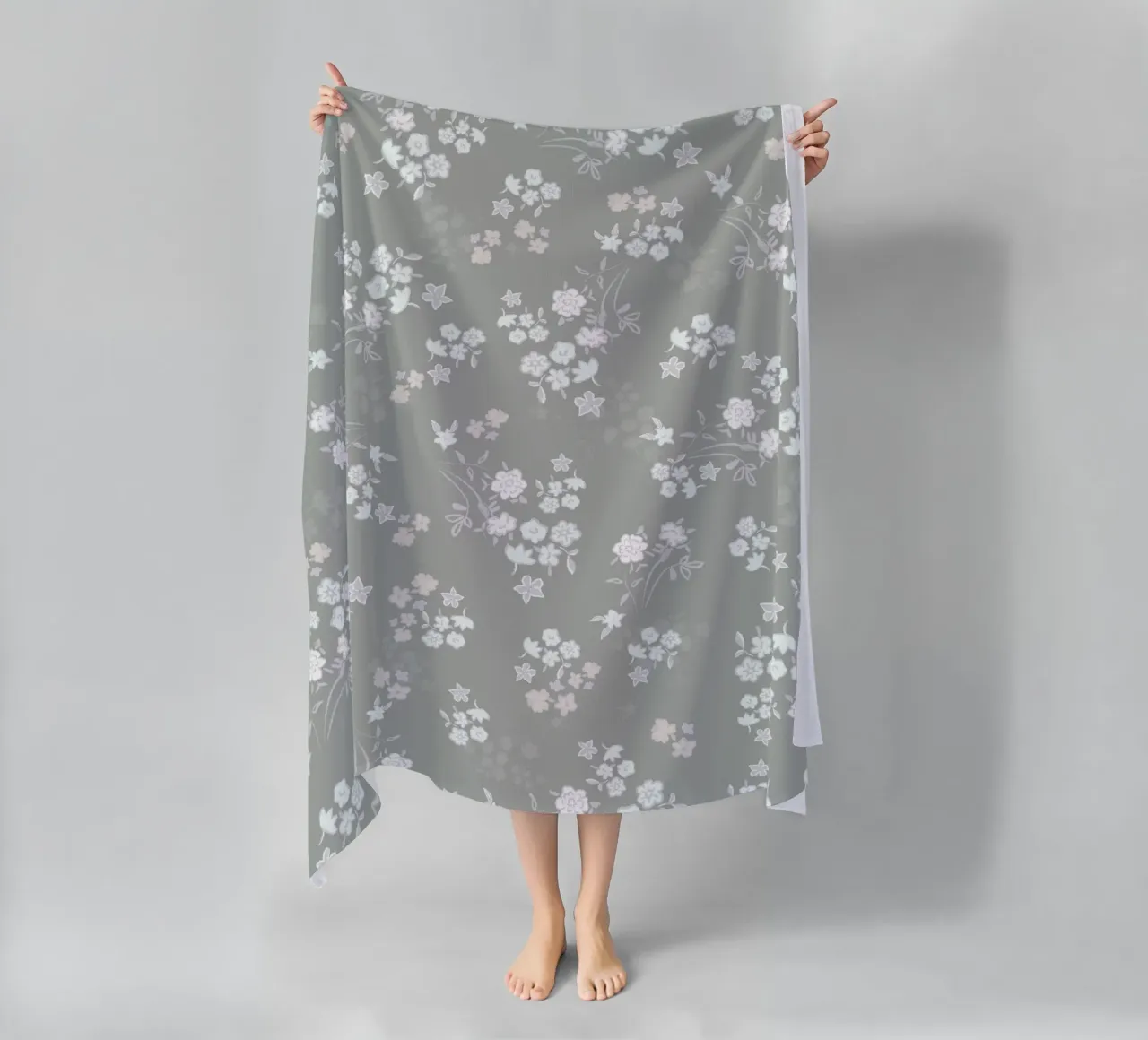 White ditsy pattern with green background beach towel by gulsengunel