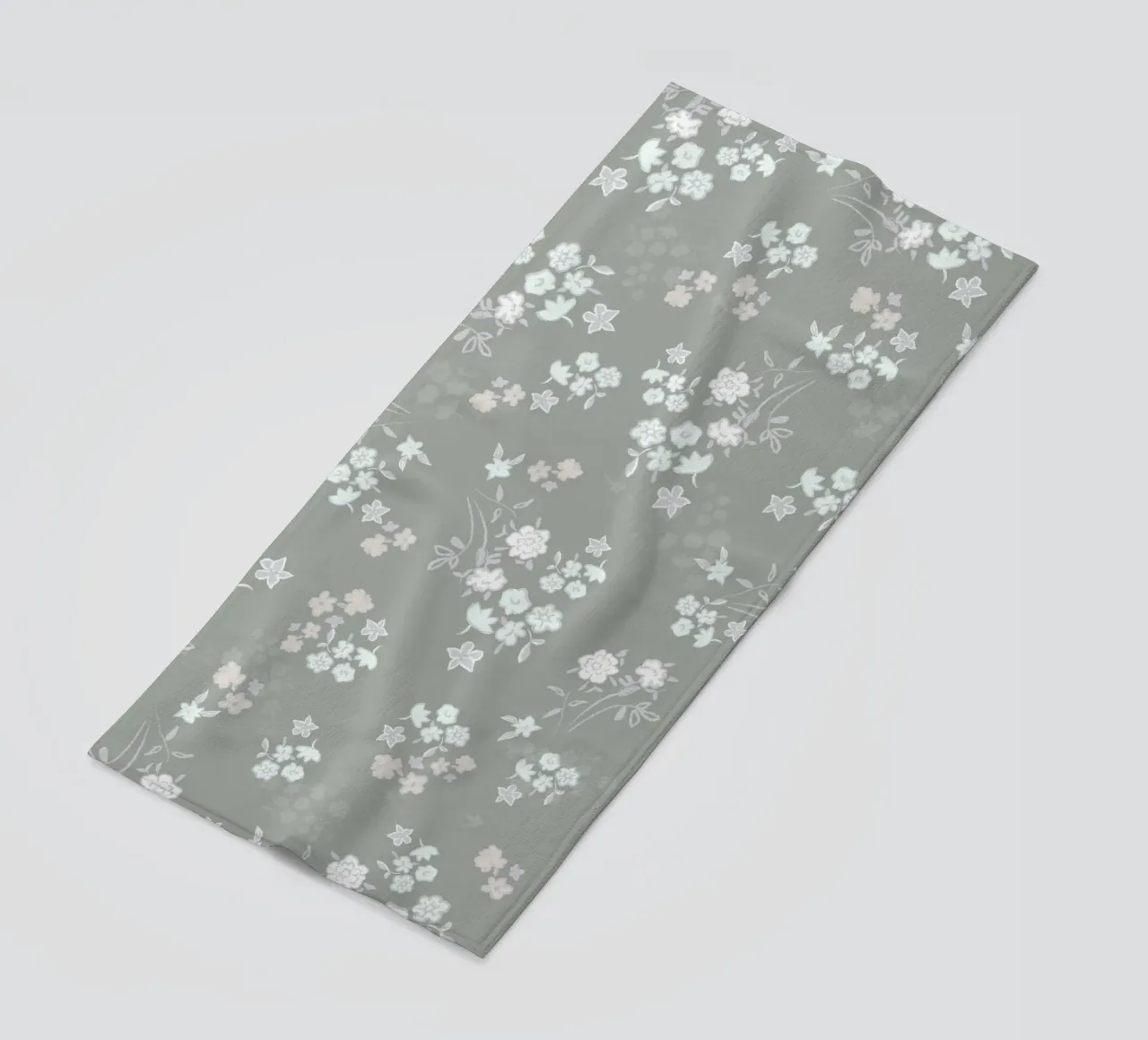 White ditsy pattern with green background beach towel by gulsengunel