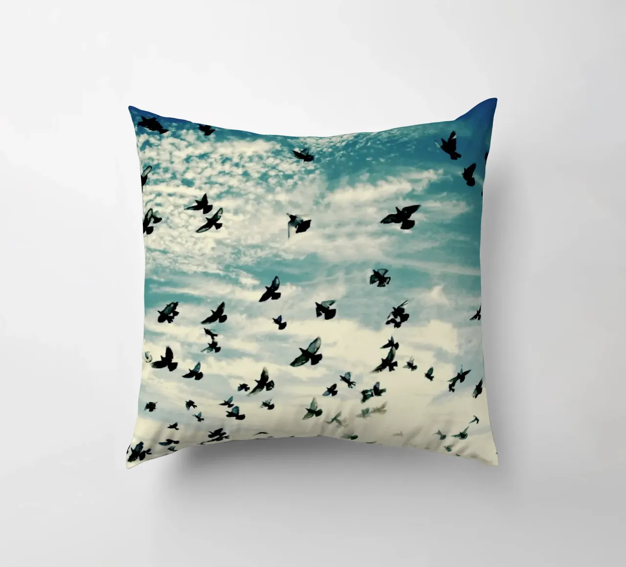 Flying Birds decorative cushion by KISSA STUDIO