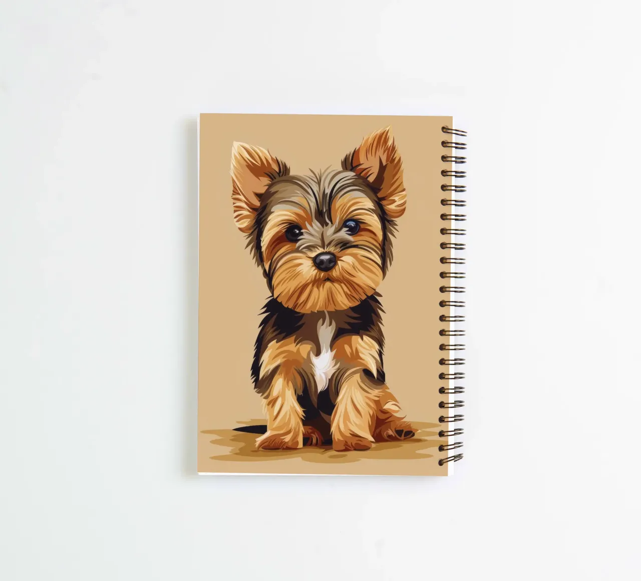 Niedlicher kleiner Hund sitzt mit verspieltem Ausdruck in einem gemütlichen Ringbuch von DesignDoodle