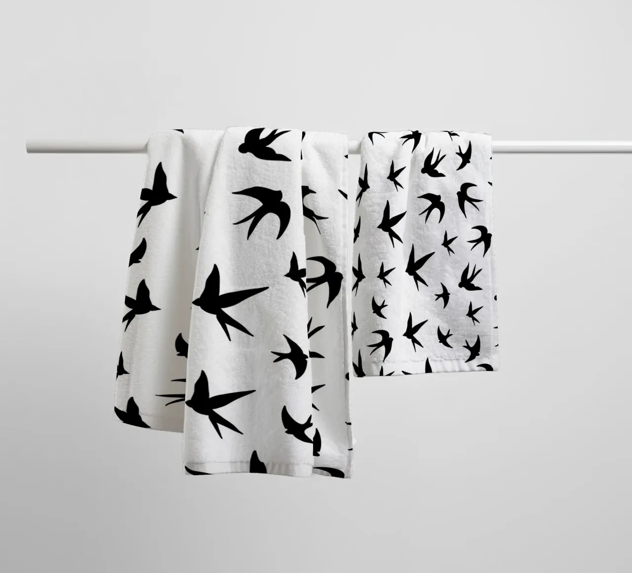 Zwaluwen vogels zwart silhouet op witte achtergrond badhanddoek van gulsengunel