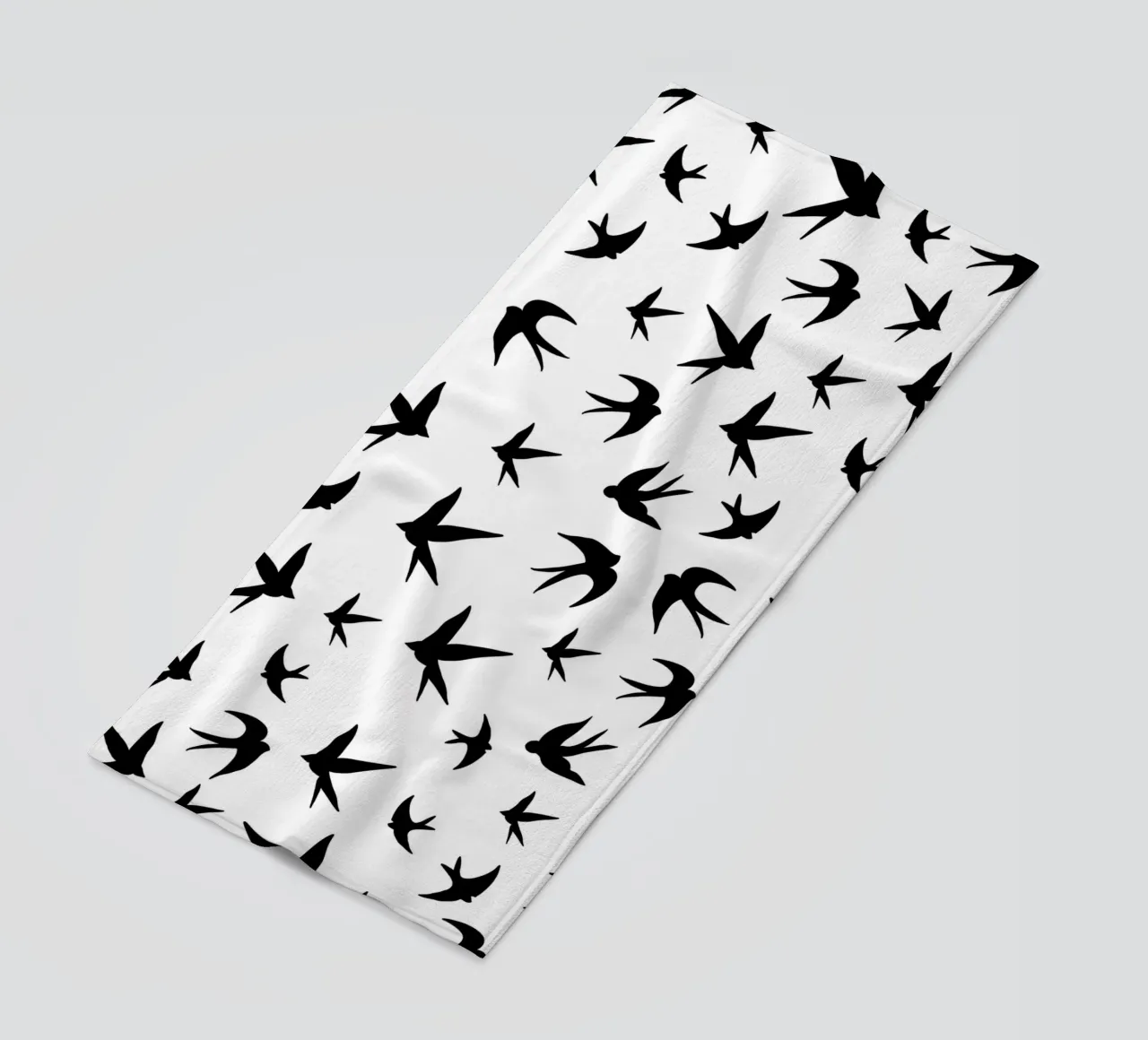 Zwaluwen vogels zwart silhouet op witte achtergrond strandhanddoek van gulsengunel